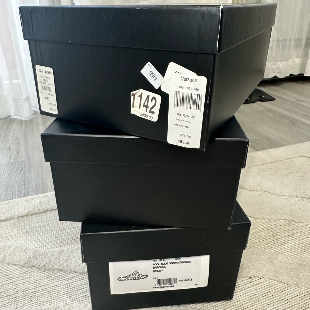3 Empty authentic Versace shoeboxes.